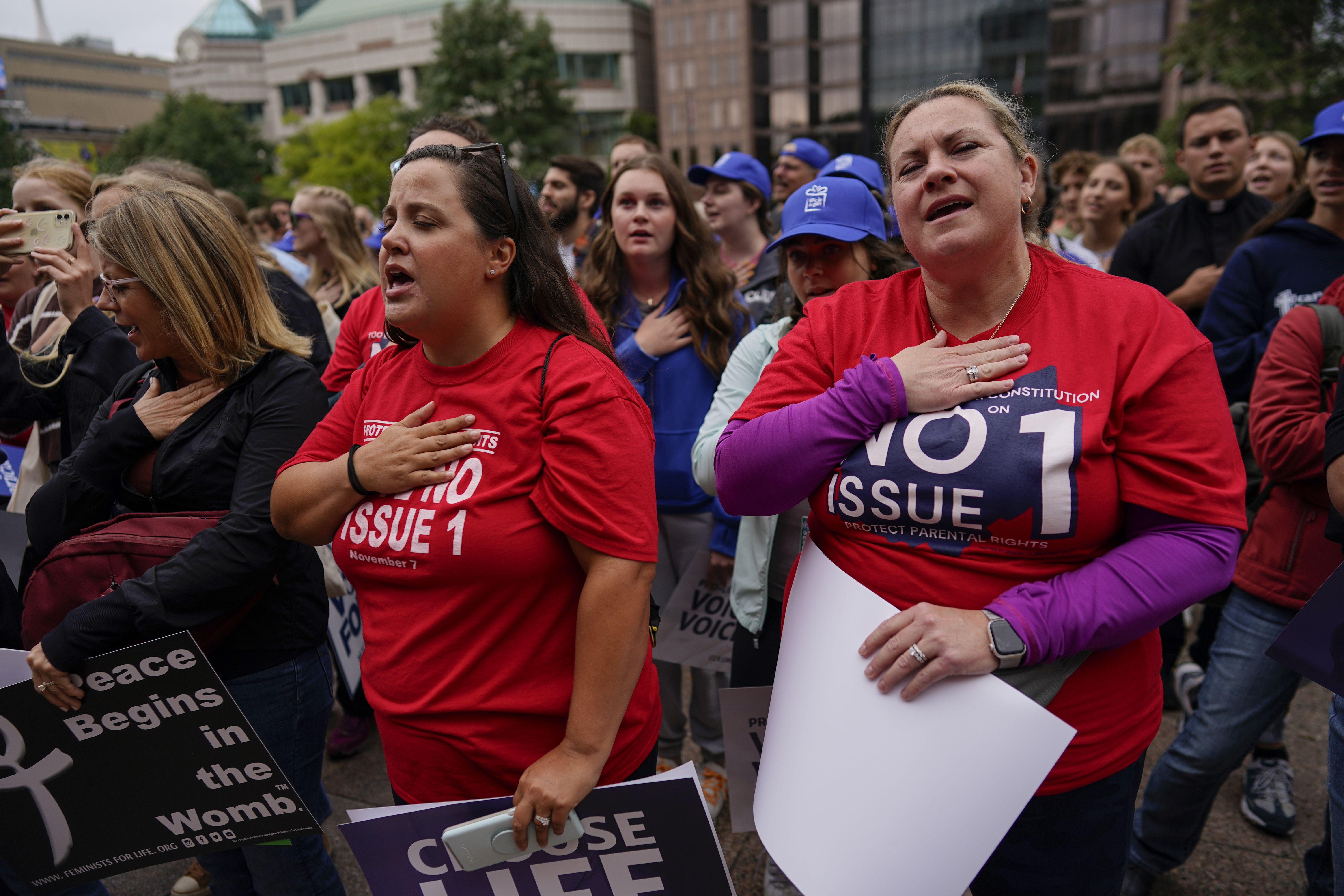 People gather and say the Pledge of Allegiance during the Ohio March for Life rally at the Ohio State House in Columbus, Ohio, on Oct. 6. It is Election Day for most of the U.S.