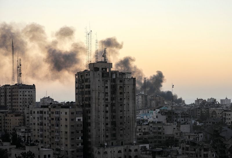 Smoke rises following Israeli strikes, amid the ongoing conflict between Israel and Palestinian Islamist group Hamas, in Gaza, Tuesday.