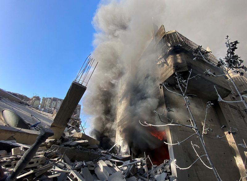 A house burns following an Israeli strike, amid the ongoing conflict between Israel and Palestinian Islamist group Hamas, in Khan Younis, in the southern Gaza Strip, Tuesday.