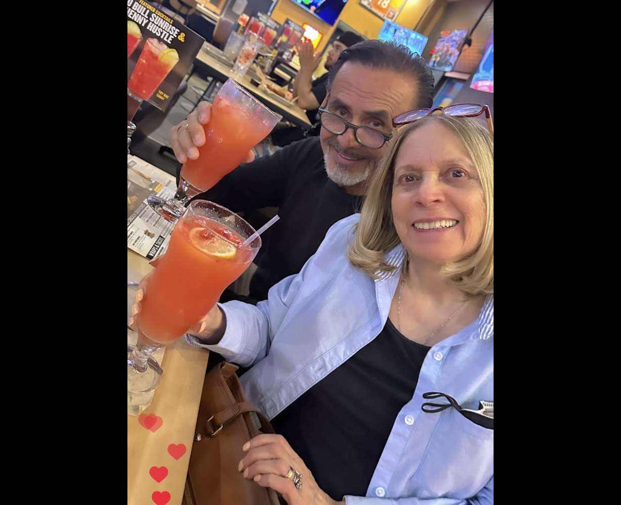 Adriana Guerra Sepulveda, right, wearing her wedding ring out with her husband in this undated photo.