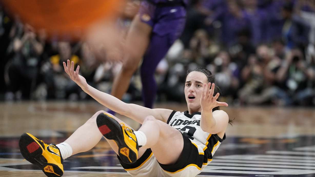 FILE -Iowa's Caitlin Clark looks for a call during the second half of the NCAA Women's Final Four championship basketball game against LSU Sunday, April 2, 2023, in Dallas. The national championship game in women's basketball last spring was unforgettable for a lot of good reasons.The game will also be remembered for its controversial officiating and The Associated Press has learned that an NCAA review concluded the refereeing did not meet expectations.
