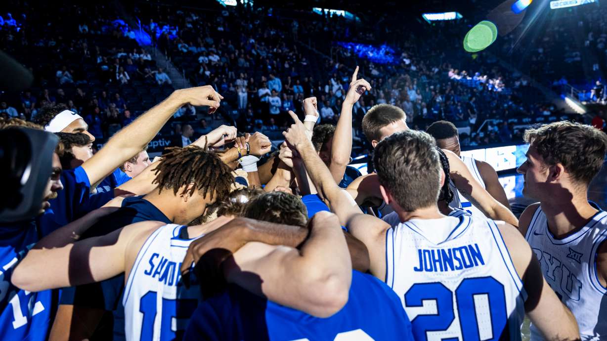 BYU men's basketball huddles before a 110-63 win over Houston Christian, Nov. 6, 2023, at the Marriott Center in Provo.