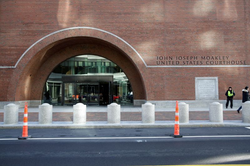 John Joseph Moakley U.S. Courthouse in Boston, Massachusetts. Prosecutors charged three people with running a brothel network in greater Boston and northern Virginia whose customers included elected officials and other leaders. 