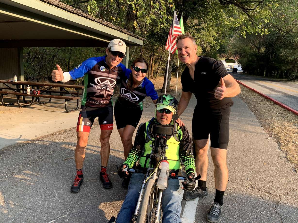Jeff Page smiles in his bike with friends Ed Chauner, Carolyn Wale and Jon Beesley after completing a 103-mile ride from South Fork Park in Provo Canyon to Ogden Canyon in October 2020.