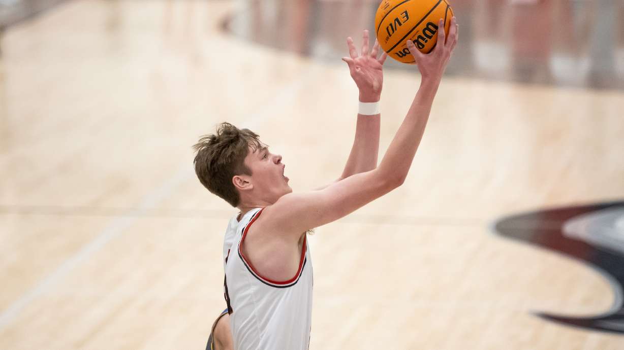 Alta’s Jaxon Johnson goes to the hoop in a high school boys basketball game against Orem in Sandy on Tuesday, Jan. 4, 2022.
