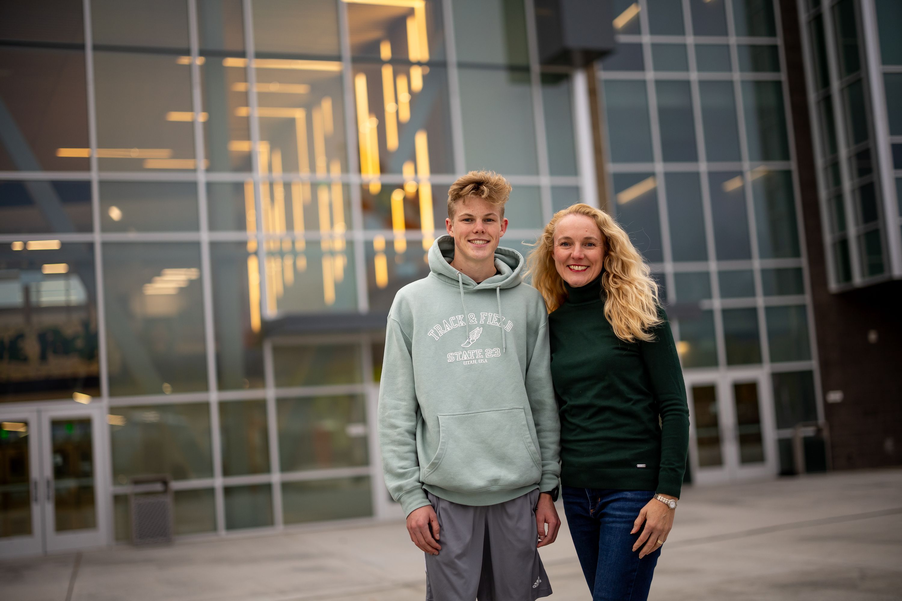 Rebecca Martin, president of the Hillcrest High School PTSA, and her son, Joshua Martin, 16, pose for a photo at the school in Midvale on Tuesday. A recent poll of parents of school-age children conducted for the Deseret News and the Hinckley Institute of Politics largely indicated satisfaction with their neighborhood schools.