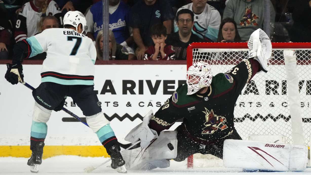 Arizona Coyotes goaltender Connor Ingram makes a save on a shot by Seattle Kraken right wing Jordan Eberle in a shootout during an NHL hockey game on Nov. 7, 2023, in Tempe, Ariz.