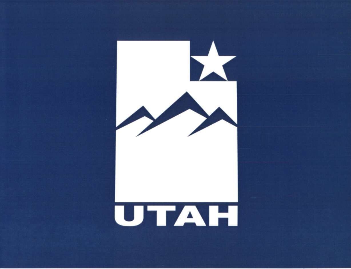 A Utah flag design white bordered blue field includes a white silhouette of the shape of Utah with chevrons depicting mountains, a white star. It's one of over 1,000 designs to feature a star in it.