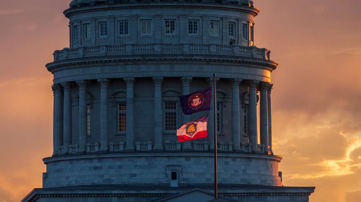 The new Utah flag flies beneath the state's historical flag at the Utah Capitol on July 9. A recently completed state collection provides access to the more than 7,000 possible new flag designs that were submitted in 2022.