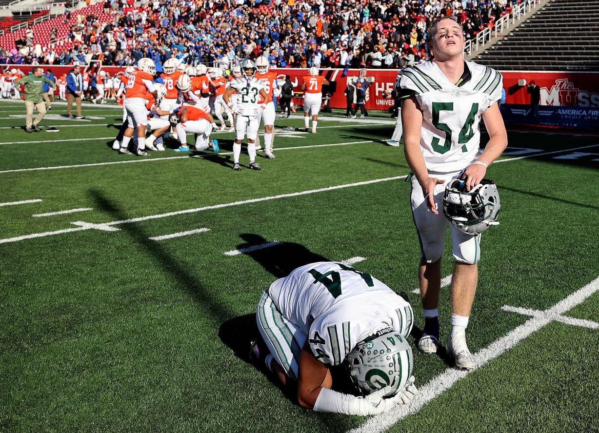 Olympus players react to losing a 5A football state semifinal game against Timpview at Rice-Eccles Stadium in Salt Lake City on Thursday, Nov. 9, 2023. Timpview won 22-20.