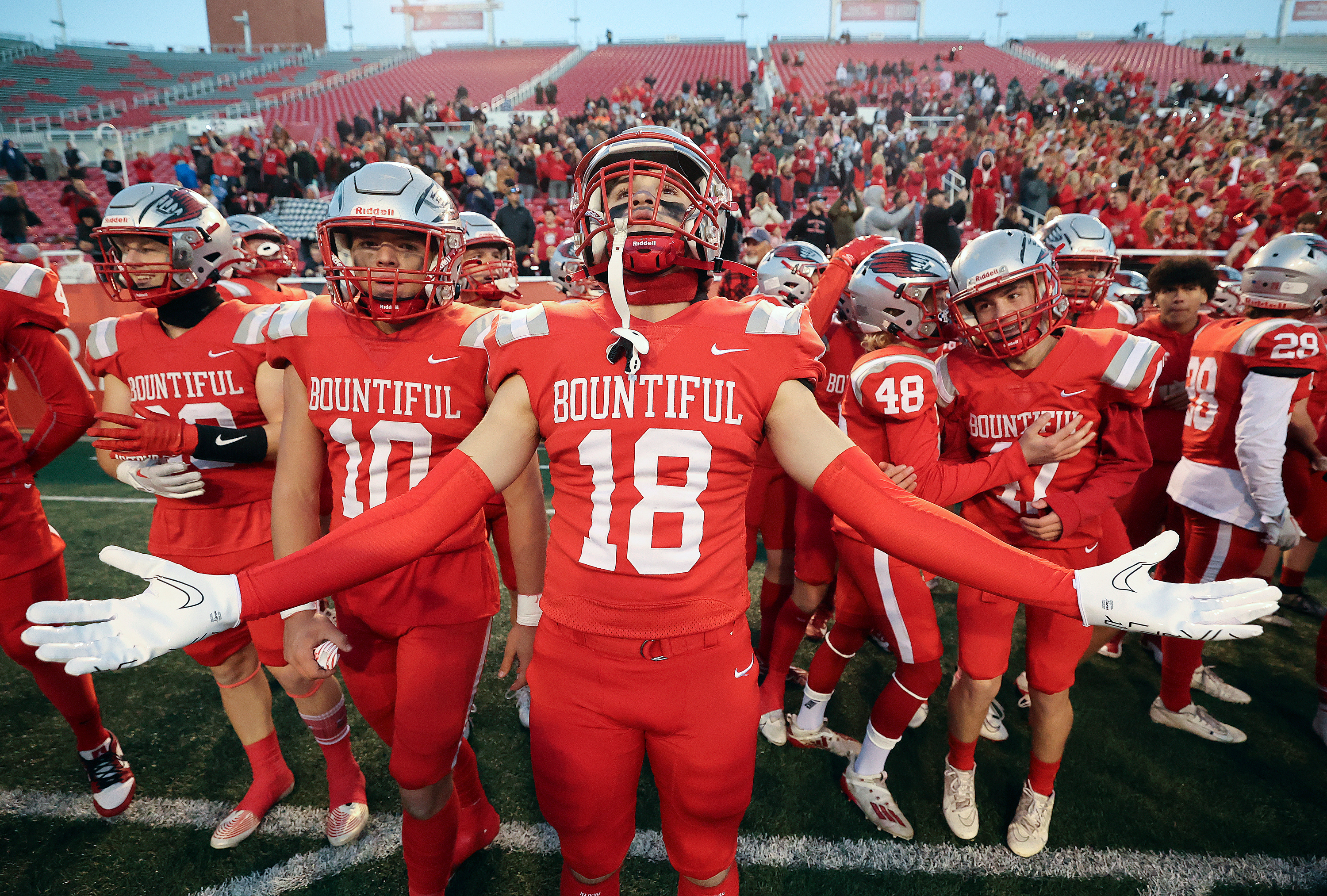 Bountiful players take in the final moments of their victorious 5A semifinal football game against Alta at Rice-Eccles Stadium in Salt Lake City on Thursday, Nov. 9, 2023. Bountiful won 20-19.