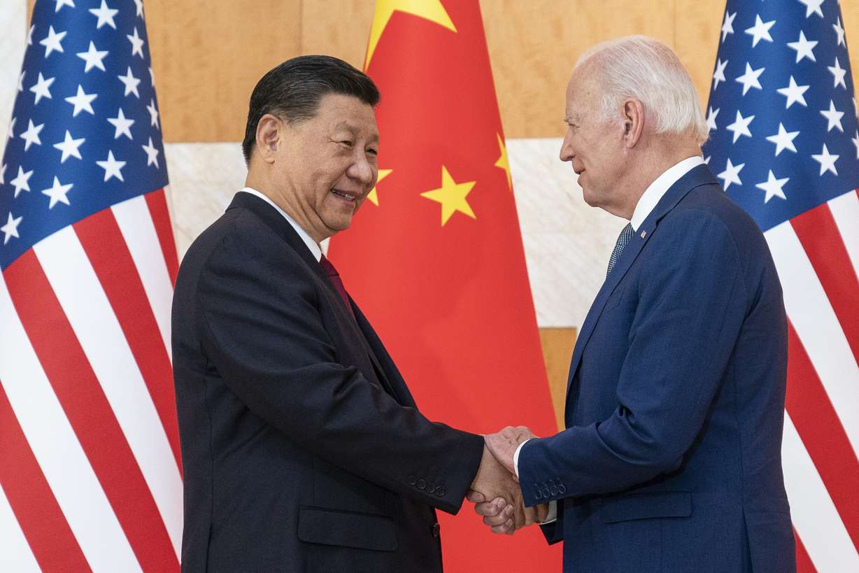 U.S. President Joe Biden, right, and Chinese President Xi Jinping shake hands before a meeting on the sidelines of the G20 summit meeting on Nov. 14, 2022, in Bali, Indonesia. Biden and Xi will hold a long-anticipated meeting Wednesday in the San Francisco Bay area.