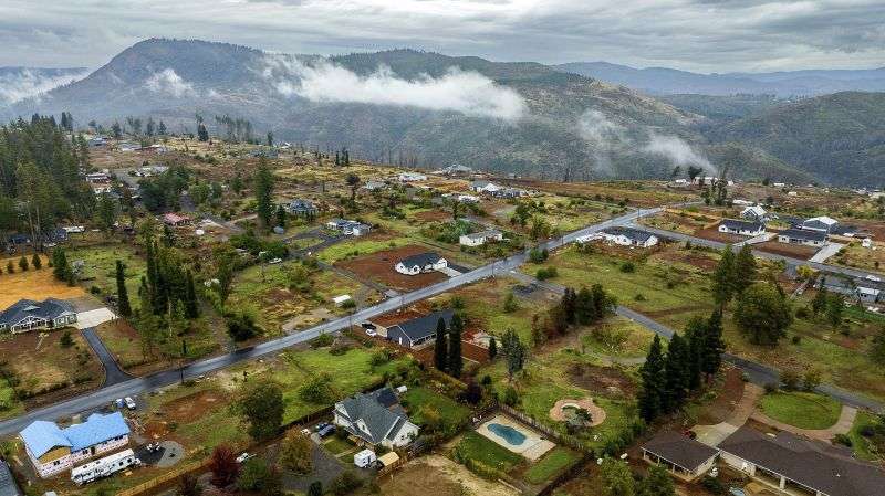 Empty lots and homes built since the Camp Fire line a neighborhood on the east side of Paradise, Calif., Oct. 25.