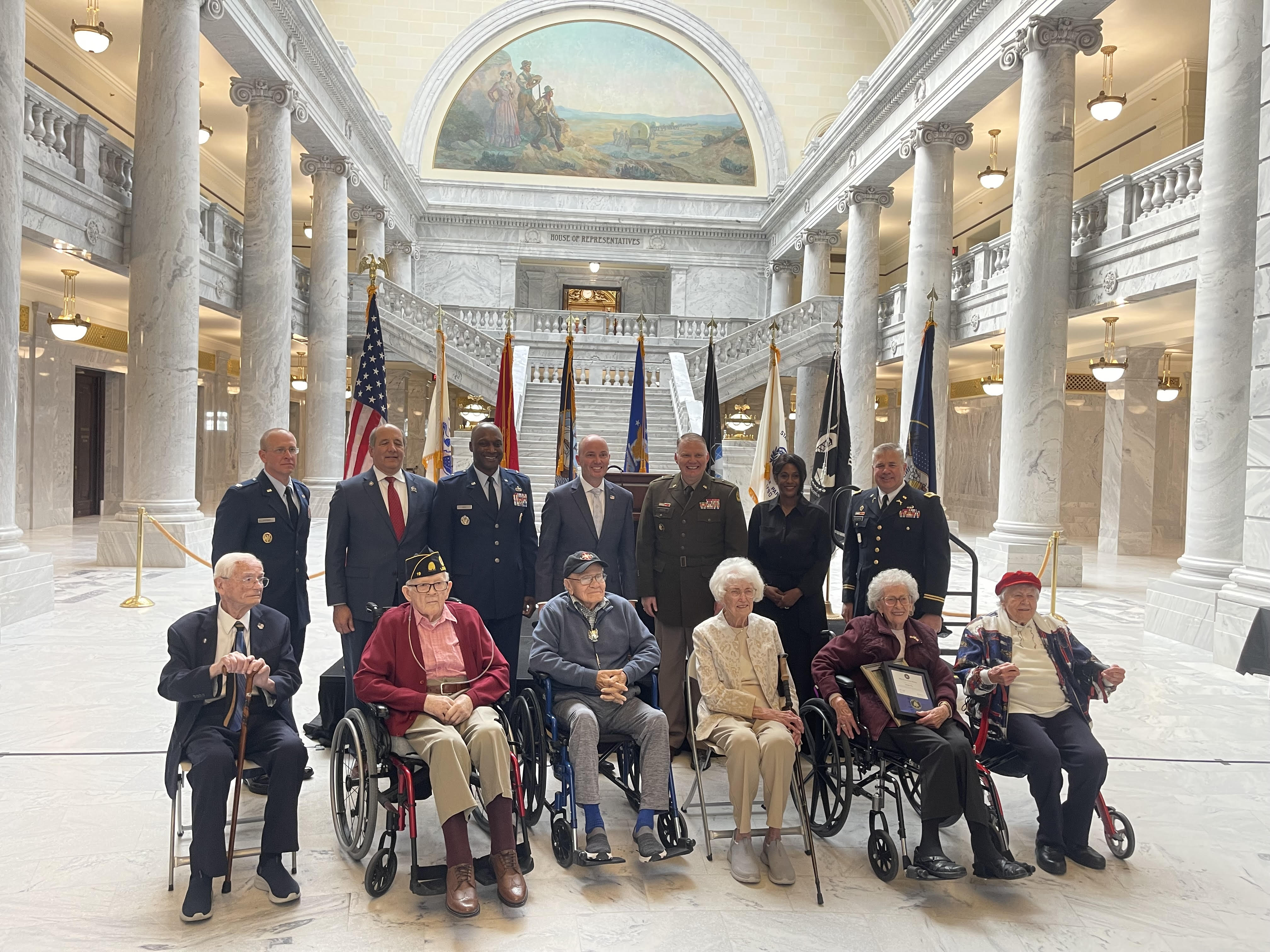 Political and military leaders pose for a picture with some of Utah's centenarian veterans during a ceremony at the state Capitol on Friday. The Utah Centenarian Veterans Ceremony paid tribute to members of the veteran community who are 100 years old.