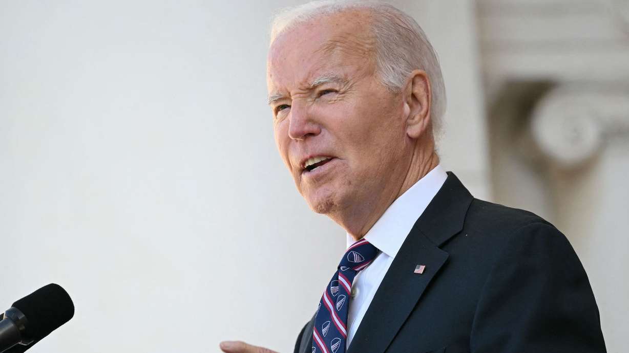 President Joe Biden speaks at the Memorial Amphitheater in Arlington National Cemetery during celebrations for Veterans Day, on Nov. 11, in Arlington, Virginia. President Biden described the site as a "sanctuary of sacrifice."