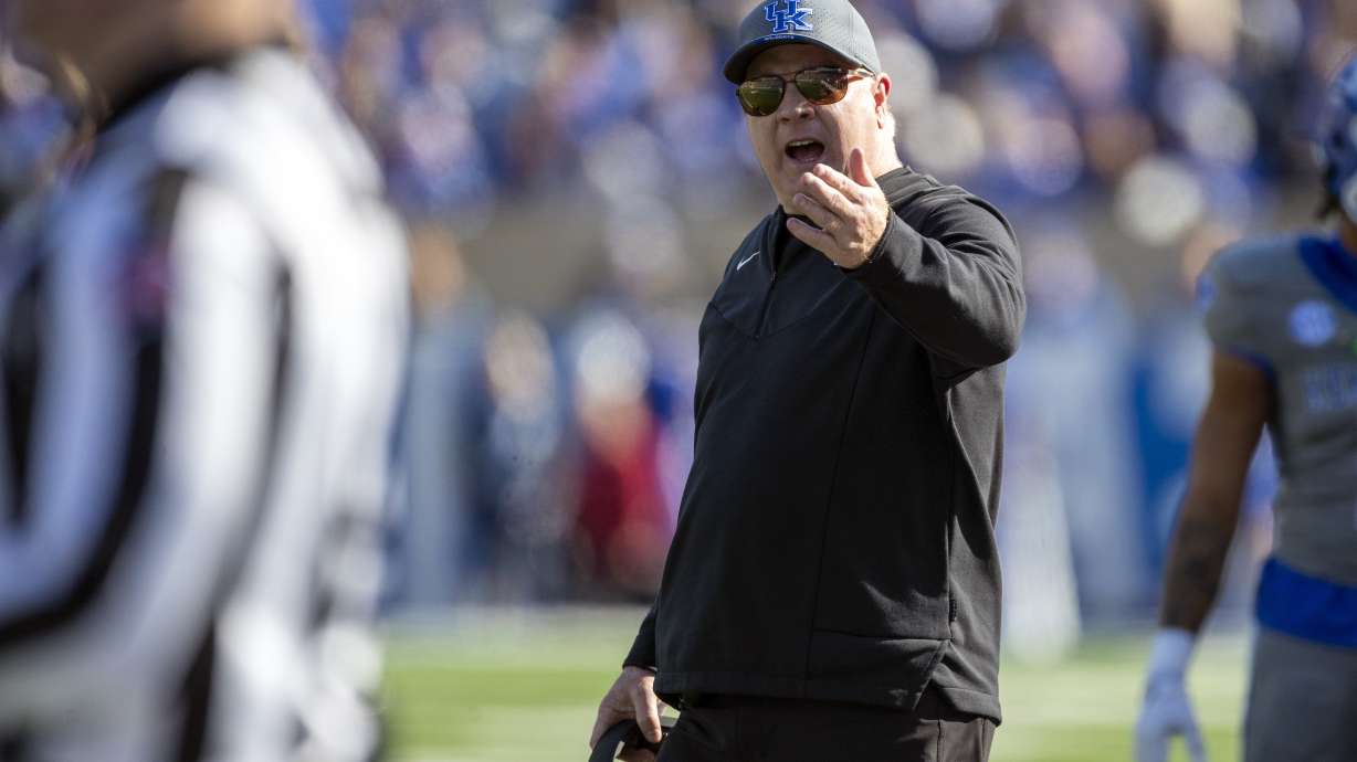 Kentucky head coach Mark Stoops yells at the referee during the first half of an NCAA college football game against Alabama in Lexington, Ky., Saturday, Nov. 11, 2023.