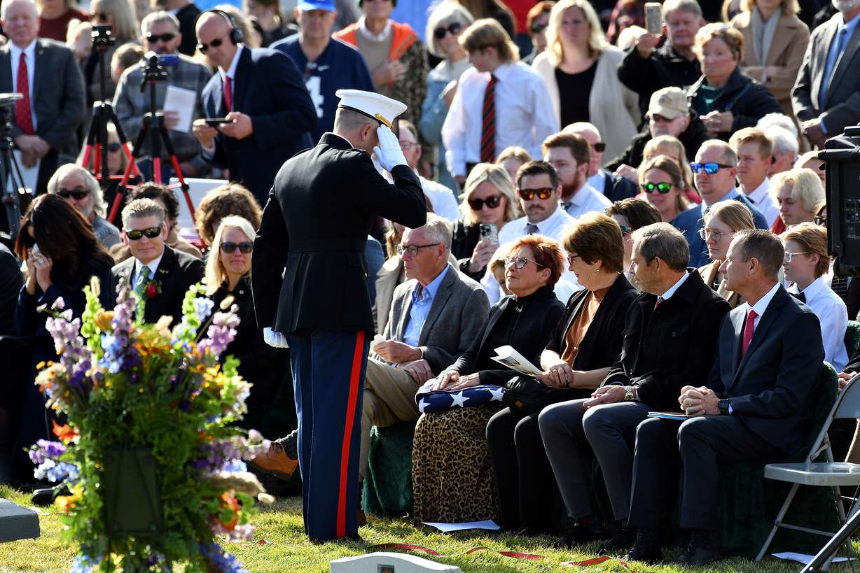 U.S. Marine Corps Capt. Ralph Jim Chipman’s wife Susan Richards is saluted after being presented with an American flag as family friends and community members attend a memorial service at American Fork city cemetery for Chipman, who was lost during battle in Vietnam 50 years ago, on Saturday, Nov. 11, 2023. His remains were identified and returned to his family to be laid to rest.