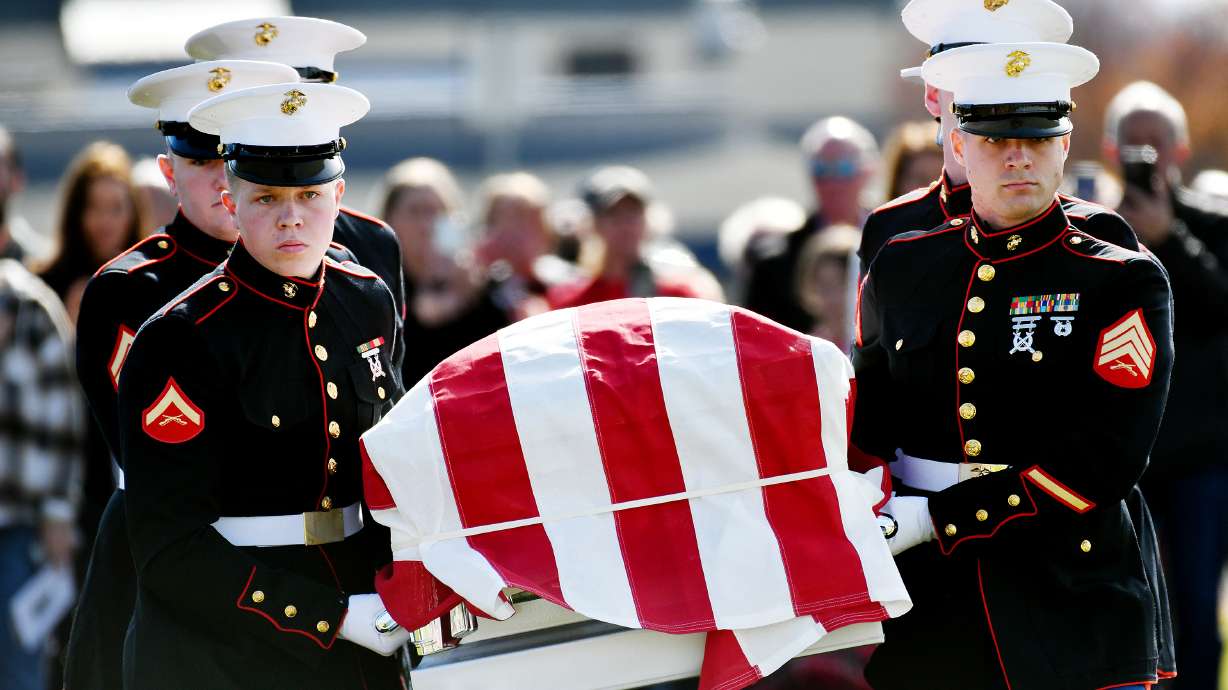 Members of the United States Marines carry the casket during a memorial service at American Fork city cemetery for U.S. Marine Corps Capt. Ralph Jim Chipman, who was lost during battle in Vietnam 50 years ago, on Saturday.