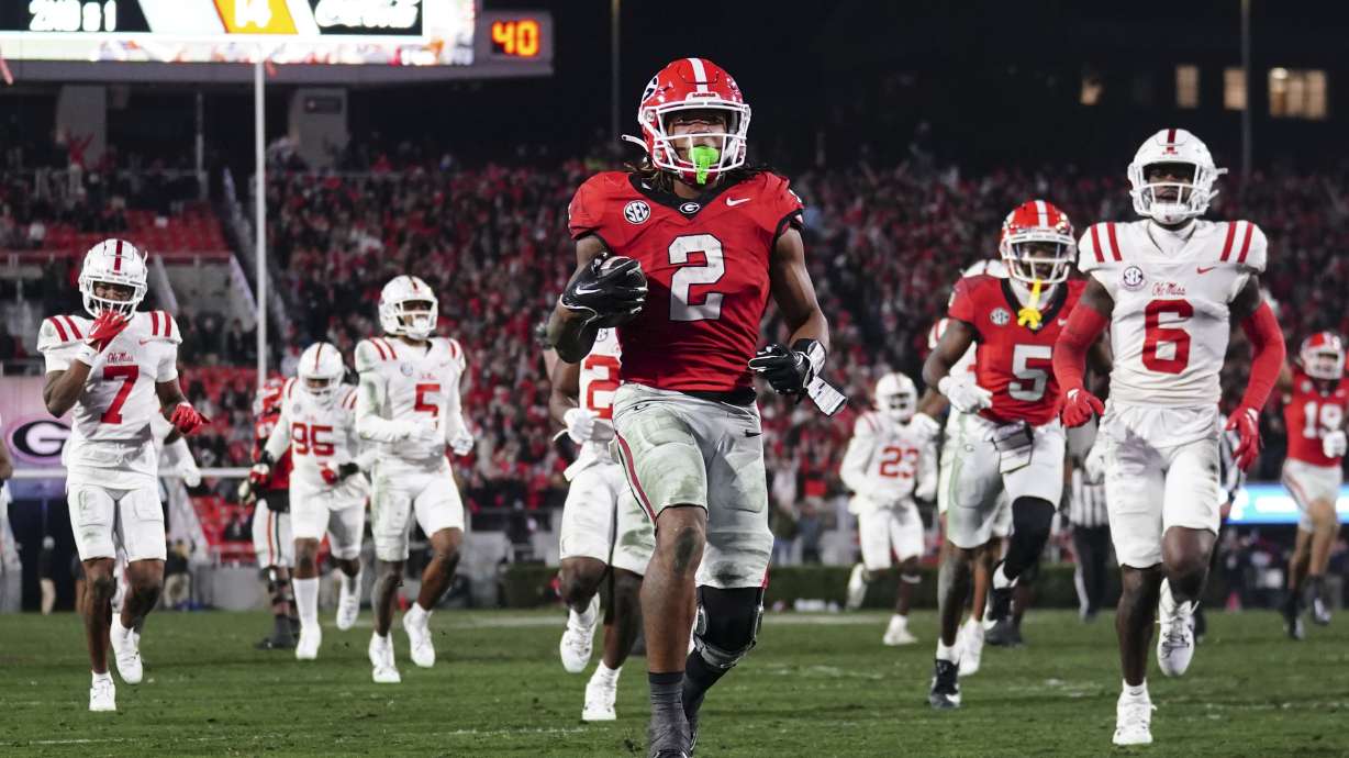 Georgia running back Kendall Milton (2) runs for a touchdown against Mississippi during the second half of an NCAA college football game, Saturday, Nov. 11, 2023, in Athens, Ga.