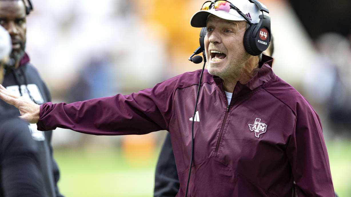 Texas A&M head coach Jimbo Fisher yells at his players during the second half of an NCAA college football game against Tennessee, Saturday, Oct. 14, 2023, in Knoxville, Tenn.
