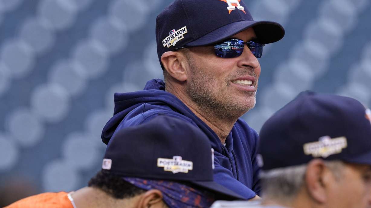 FILE - Houston Astros bench coach Joe Espada watches batting practice ahead of Game 2 of baseball's American League Championship Series between the Houston Astros and the New York Yankees, Thursday, Oct. 20, 2022, in Houston. Espada will be introduced as manager of the Houston Astros on Monday, Nov. 13, 2023, a person familiar with the hiring told The Associated Press. The person spoke to the AP on condition of anonymity Sunday because the team hadn’t announced the decision.