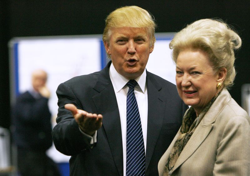 Former President Donald Trump gestures as he stands next to his sister Maryanne Trump Barry, during a break in proceedings of the Aberdeenshire Council inquiry into his plans for a golf resort, Aberdeen, northeast Scotland June 10, 2008. Barry has died at 86, the New York Times reported on Monday.