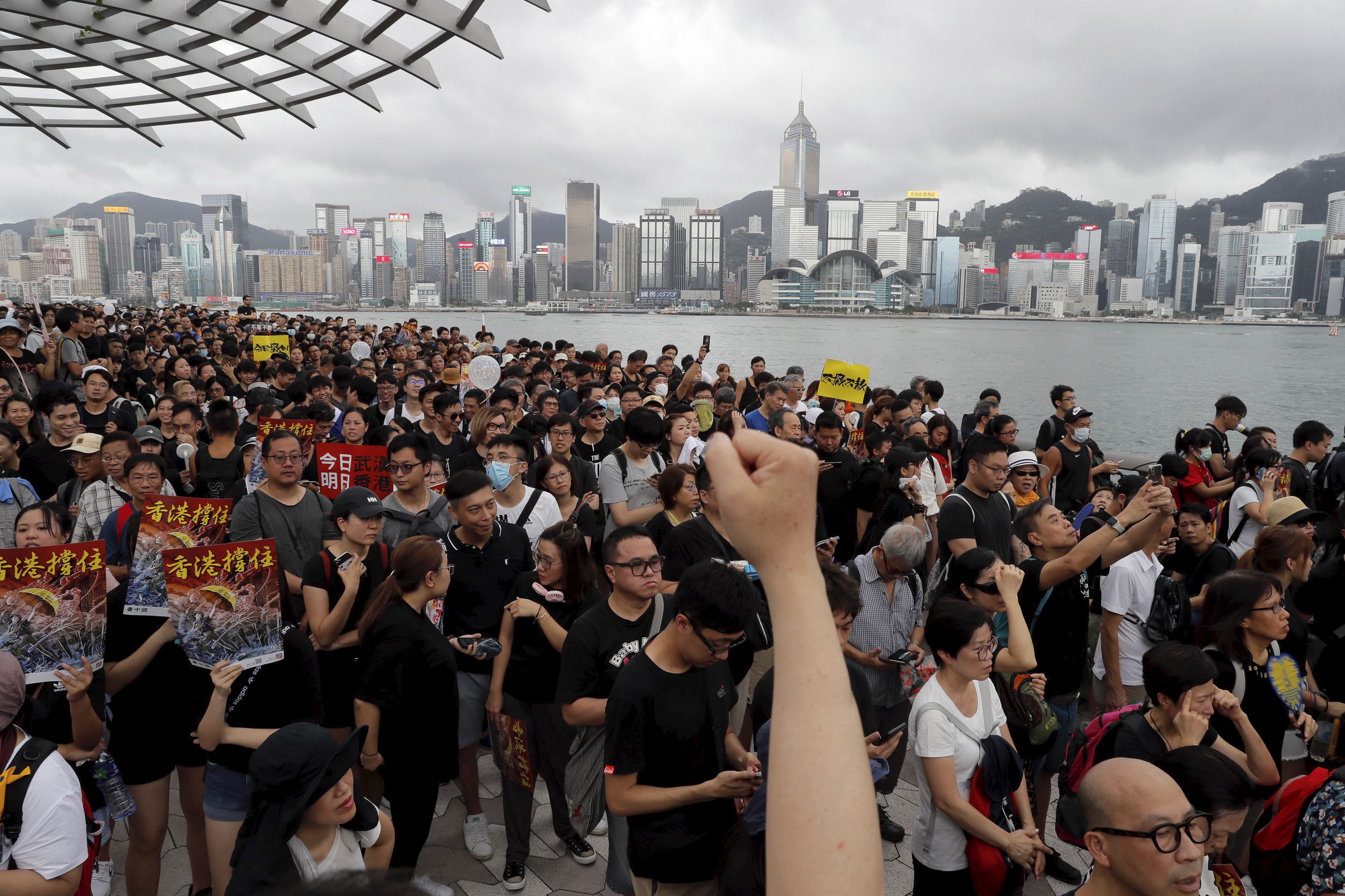 Protesters march in Hong Kong in July 7, 2019. Rep. John Curtis is one of five U.S. lawmakers named in a petition filed to Hong Kong’s High Court that would enable Hong Kong citizens and law enforcement to arrest them in the city.