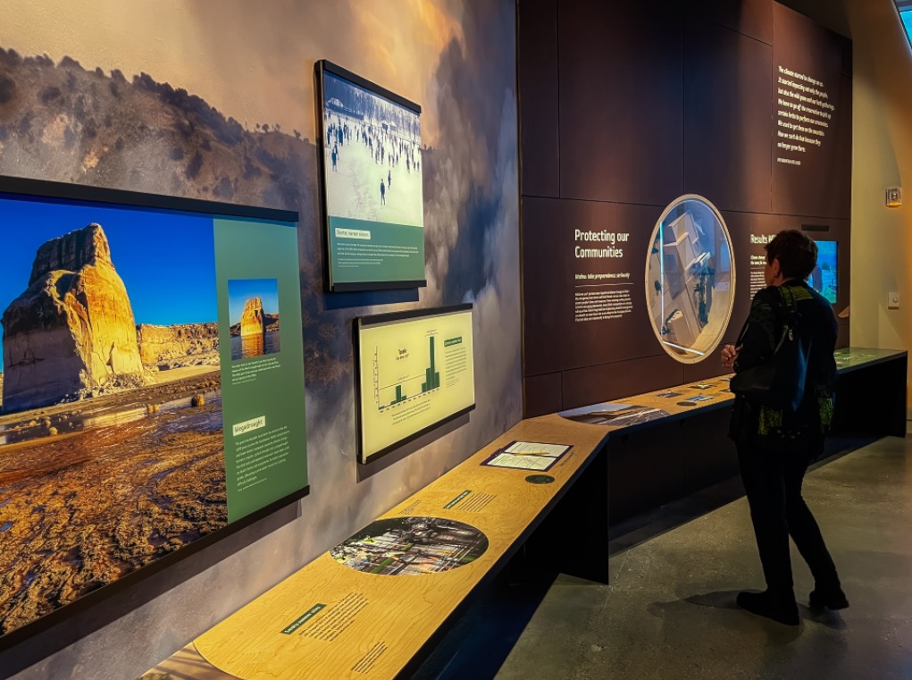 People view parts of the Natural History Museum of Utah's new "A Climate of Hope" exhibit on Saturday. It's the museum's first permanent exhibit in over a decade.