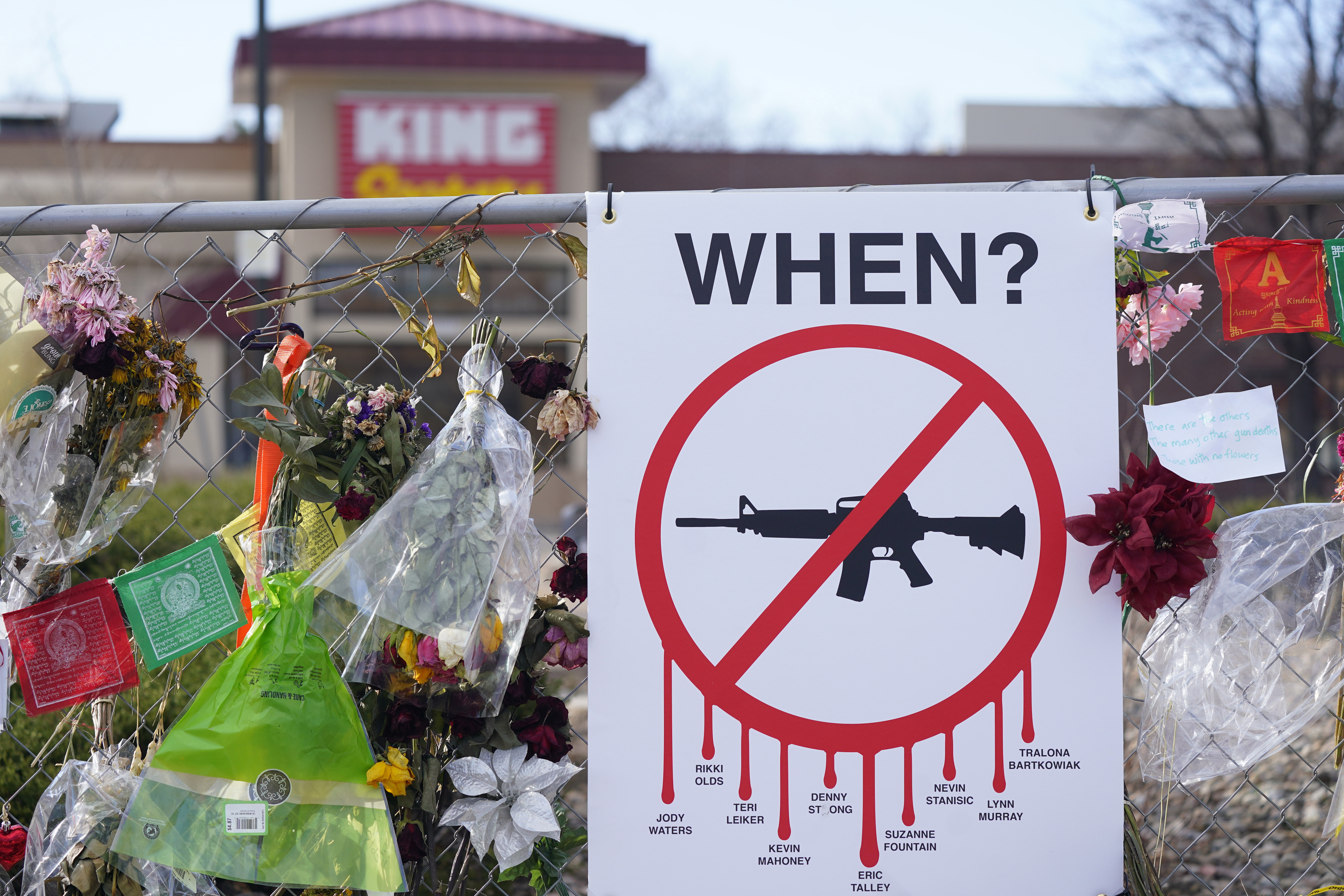 Tributes at a King Soopers grocery store in which 10 people died in a late March 2021 mass shooting, April 9, 2021, in Boulder, Colo. More than two years after police say Ahmad Al Aliwi Alissa shot and killed 10 people at the supermarket, he has pleaded not guilty by reason of insanity.