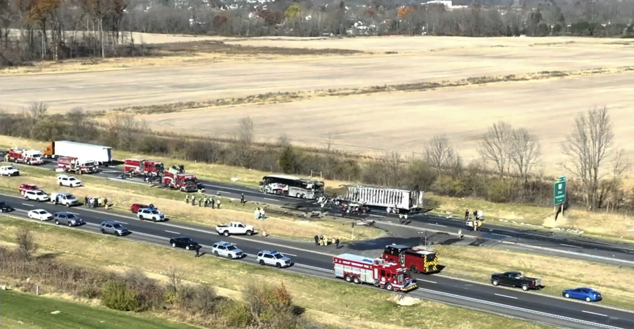Emergency responders are on the scene of a fatal accident on Interstate 70 West in Licking County, Ohio, Tuesday. An emergency official says a charter bus carrying students from a high school was rear-ended by a semi-truck on the Ohio highway.