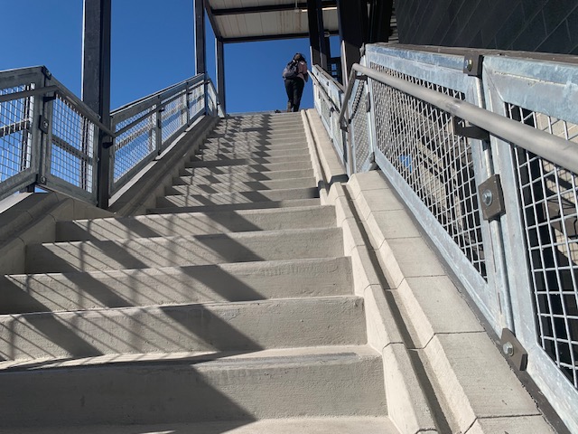 The staircase of the new pedestrian bridge at Provo Central Station features a groove along the staircase for bikes to be transferred smoothly up and down the stairs.