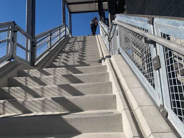 The staircase of the new pedestrian bridge at Provo Central Station features a groove along the staircase for bikes to be transferred smoothly up and down the stairs.