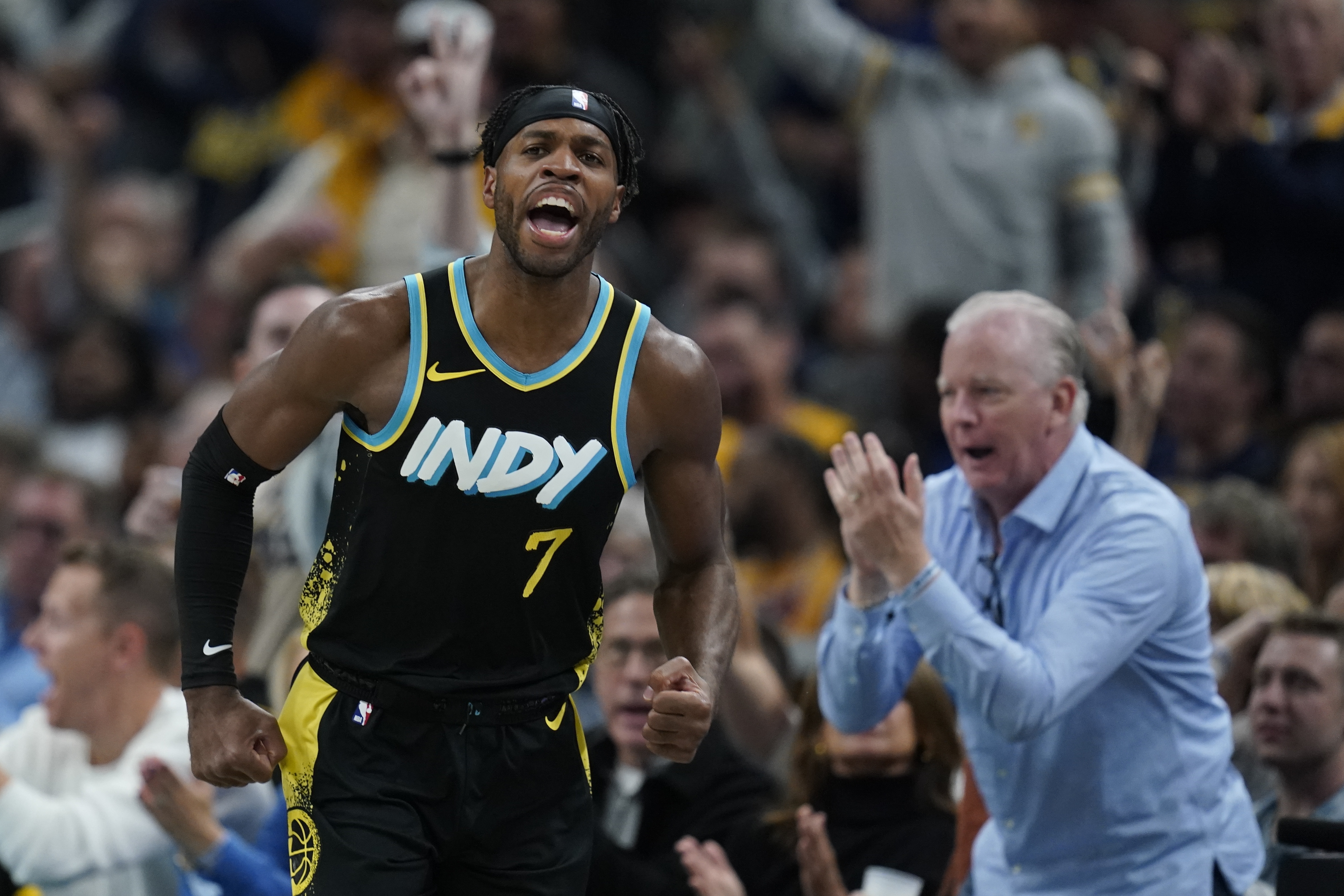 Indiana Pacers' Buddy Hield (7) reacts after hitting a shot during the second half of an NBA basketball game against the Milwaukee Bucks, Thursday, Nov. 9, 2023, in Indianapolis. 