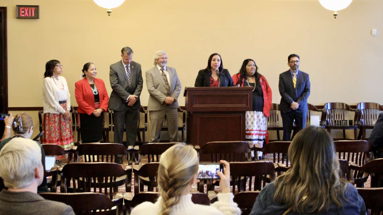 Rep. Angela Romero, center, and other members of the Utah Missing and Murdered Indigenous Relatives Task Forces discuss a new report investigating an epidemic of missing and murdered Indigenous Utahns at the Capitol on Tuesday.