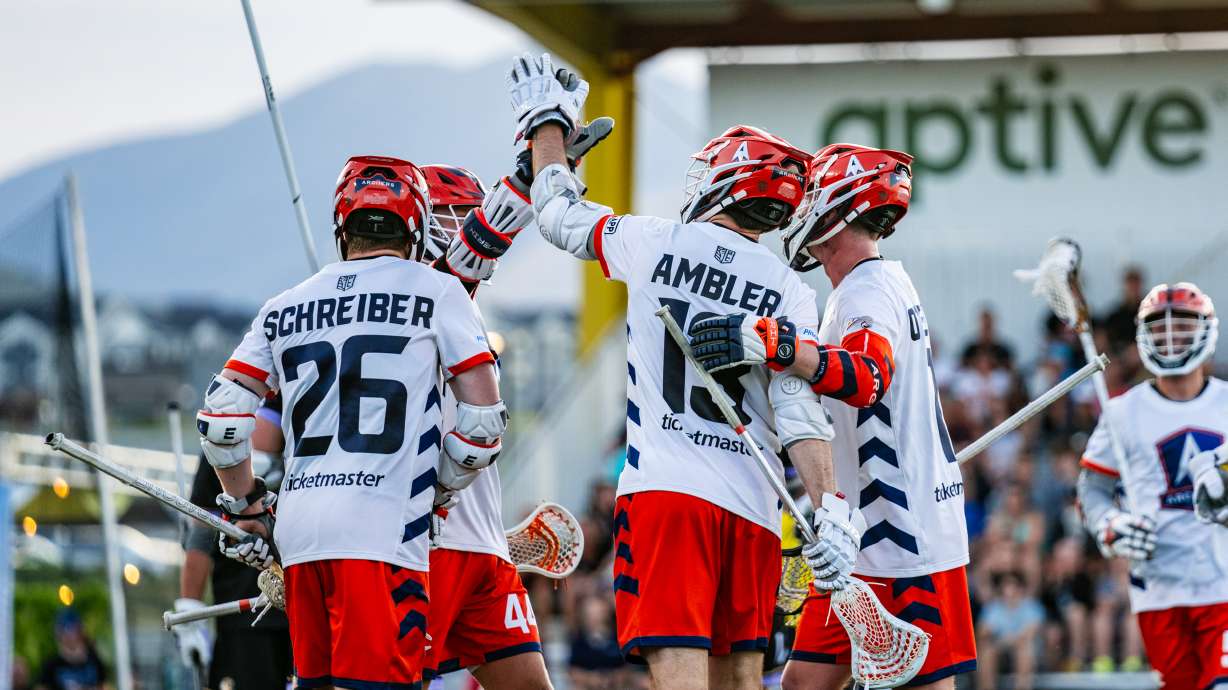 Archers teammates celebrate a goal during a Premier Lacrosse League match against Waterdogs in 2023 at Zions Bank Stadium in Herriman. After five years in the league, the Archers will rebrand as the Utah Archers under the PLL's new model.