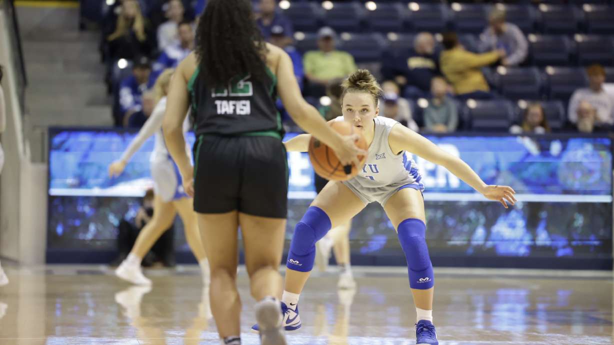 BYU guard Amari Whiting defends against Utah Valley's Eleyana Tafisi against Utah Valley during an NCAA women's basketball game, Tuesday, nov. 14, 2023, at the Marriott Center in Provo.