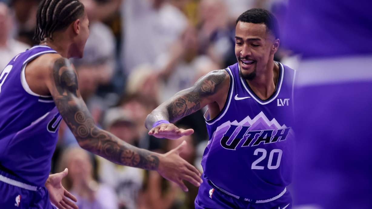 Utah Jazz guard Keyonte George (3) and forward John Collins (20) celebrate after scoring on the Portland Trail Blazers during the game at the Delta Center in Salt Lake City on Tuesday, Nov. 14, 2023.
