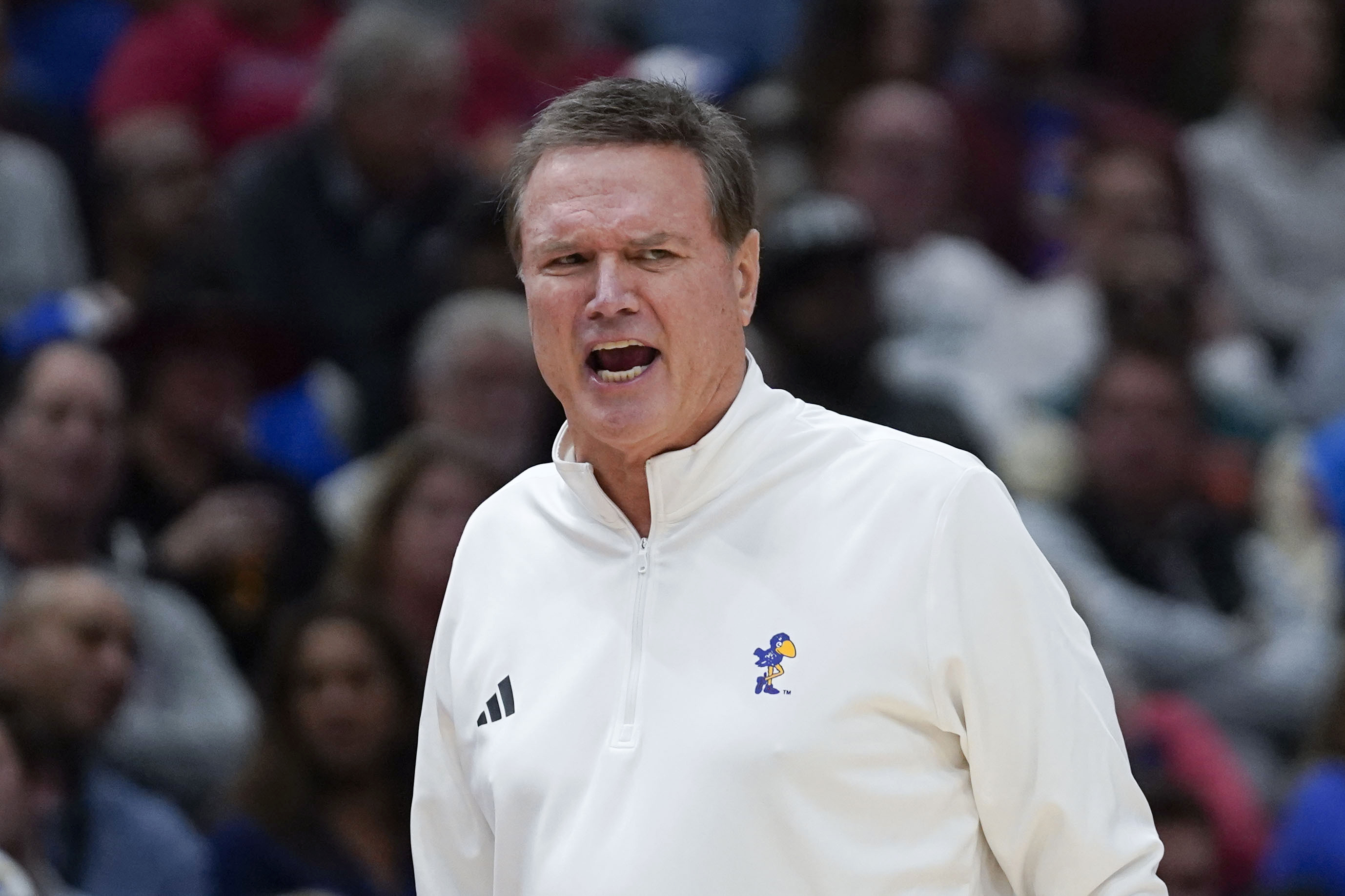 Kansas head coach Bill Self shouts from the sidelines during the first half of an NCAA college basketball game against Kentucky, Tuesday, Nov. 14, 2023, in Chicago. 