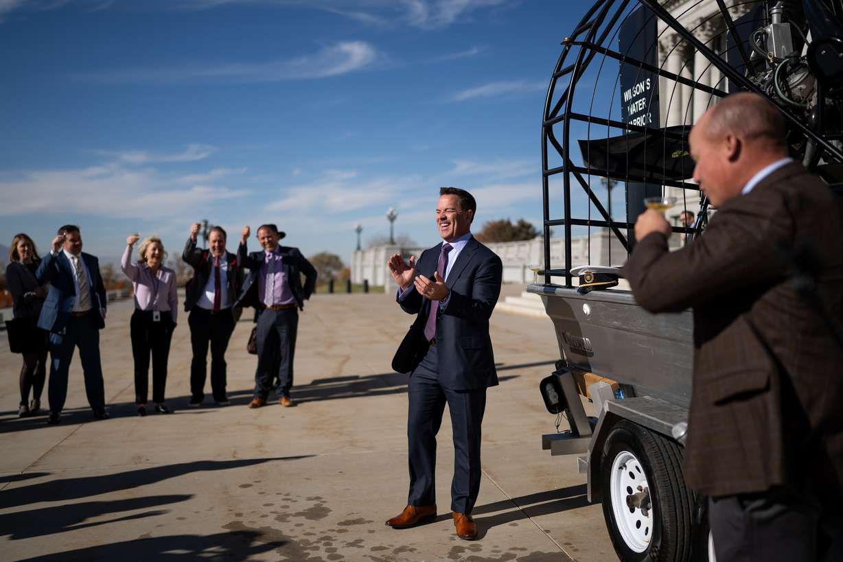 Outgoing House Speaker Brad Wilson, R-Kaysville, laughs after having a fan boat named after him at the state Capitol in Salt Lake City on Wednesday.