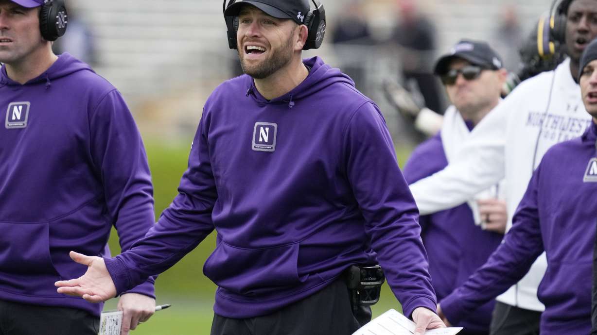 Northwestern interim head coach David Braun reacts to a call during the second half of an NCAA college football game against Maryland, Saturday, Oct. 28, 2023, in Evanston, Ill. Northwestern won 33-27.