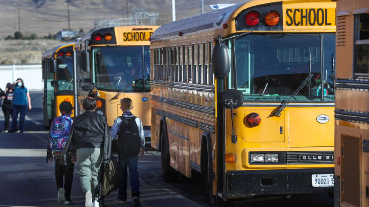 Students walk to their buses following school at Rose Springs Elementary in Erda, Tooele County, on Nov. 5, 2020. School officials are discontinuing several Dual Language Immersion programs in Tooele County next year.