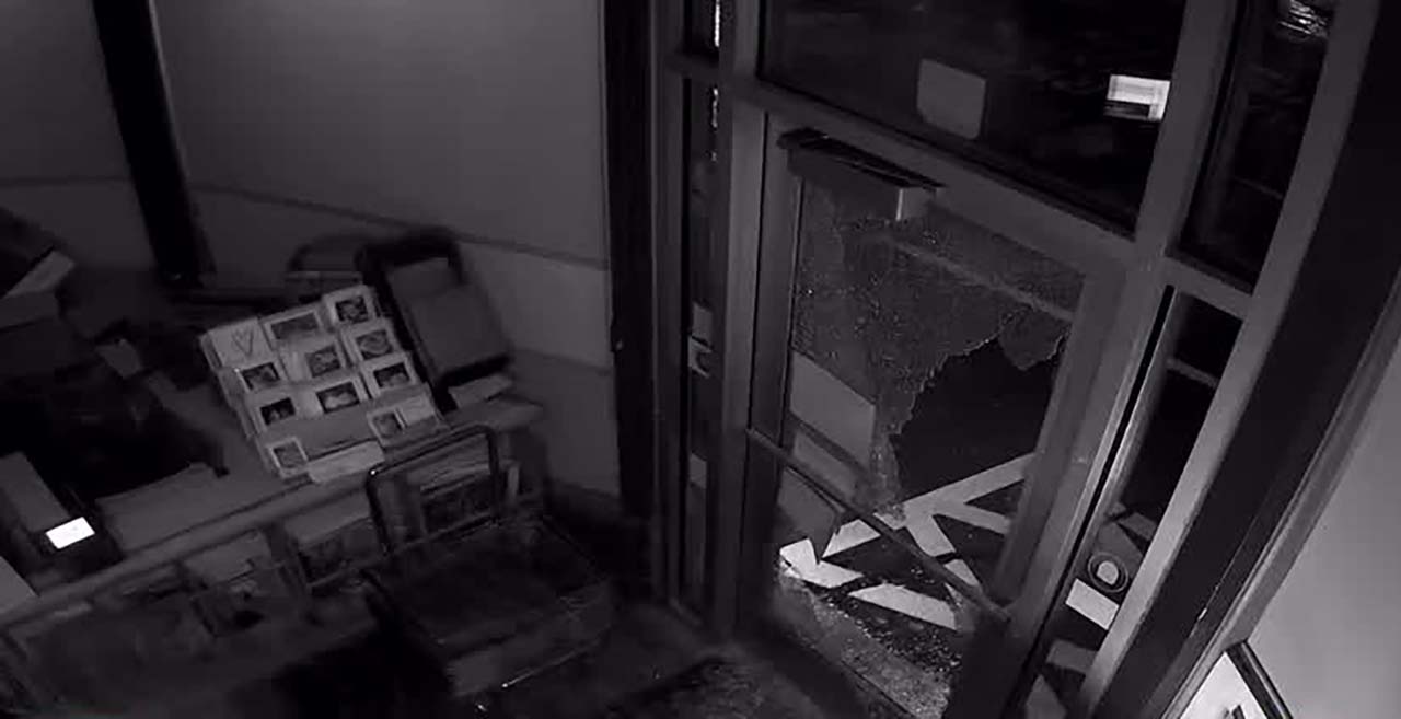 Surveillance video shows a burglar breaking into Liberty Heights Fresh in Salt Lake City Thursday. Two eastside businesses were broken into in similar fashion, owners told KSL.