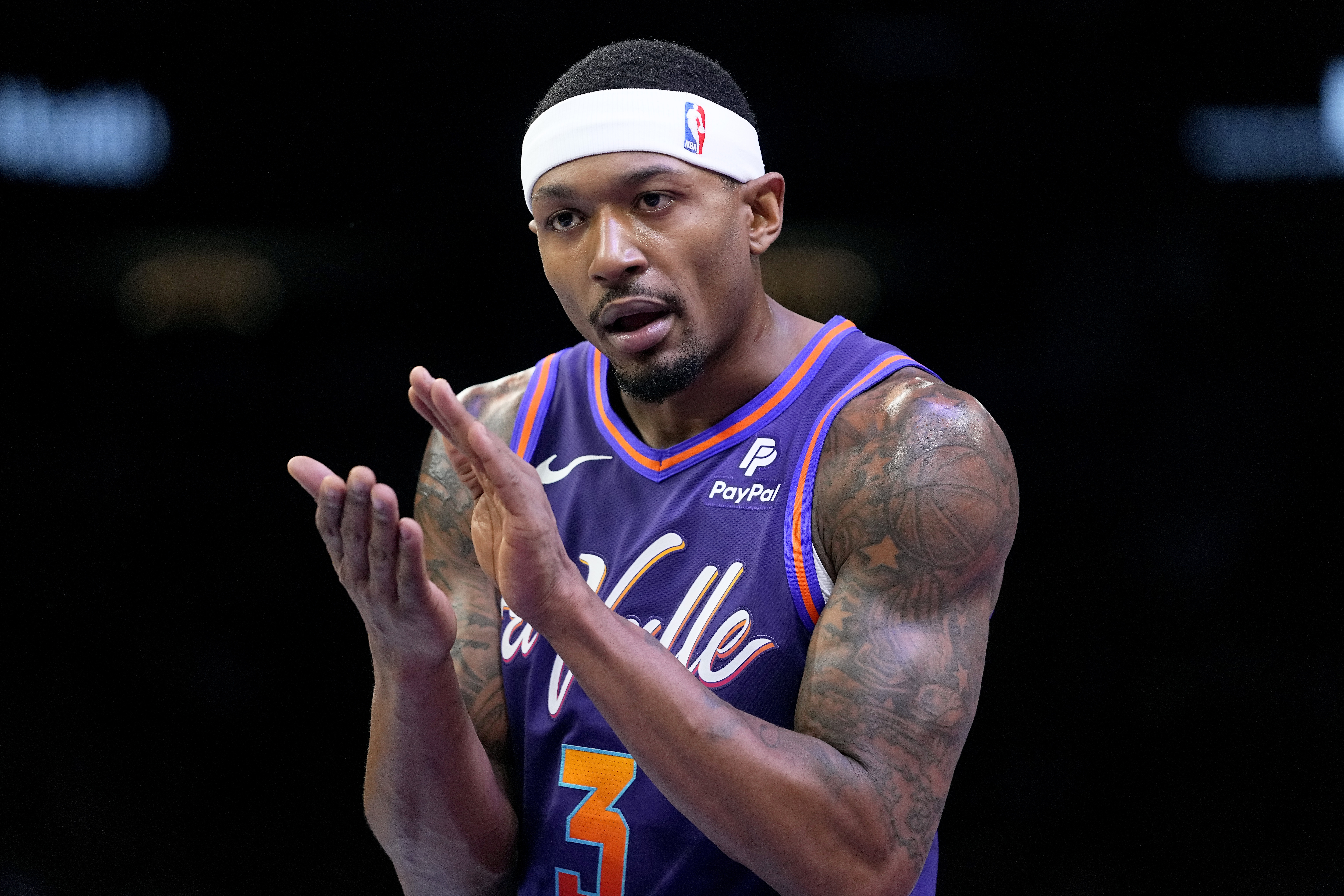 Phoenix Suns guard Bradley Beal (3) celebrates after a basket against the Los Angeles Lakers during the first half of an NBA basketball game, Friday, Nov. 10, 2023, in Phoenix. 
