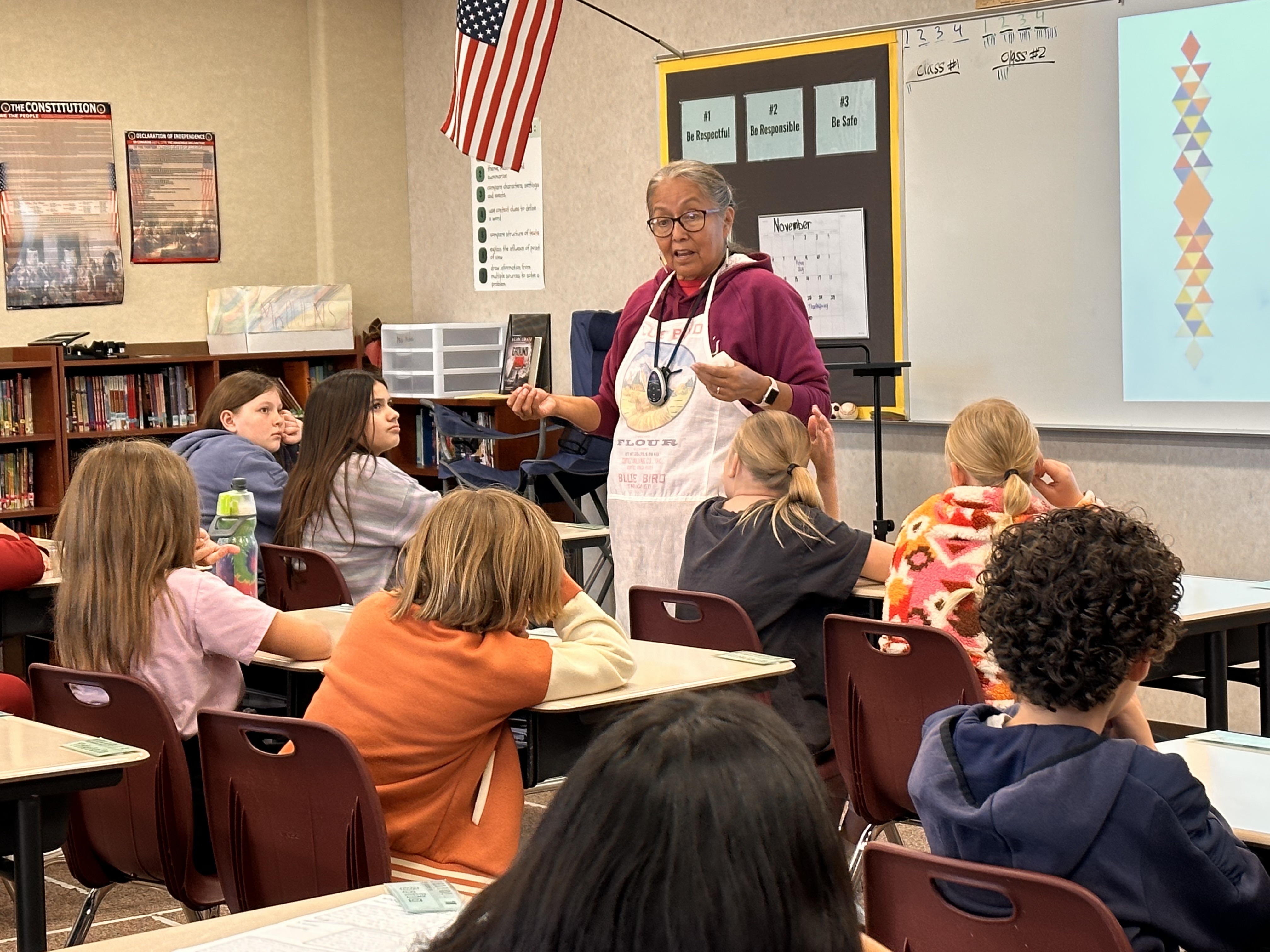 Diné educator Brenda Beyal teaches fifth graders at Meadow Brook Elementary School about fry bread on Nov. 13 as part of a lesson from the BYU Arts Partnership's Native American Curriculum Initiative.