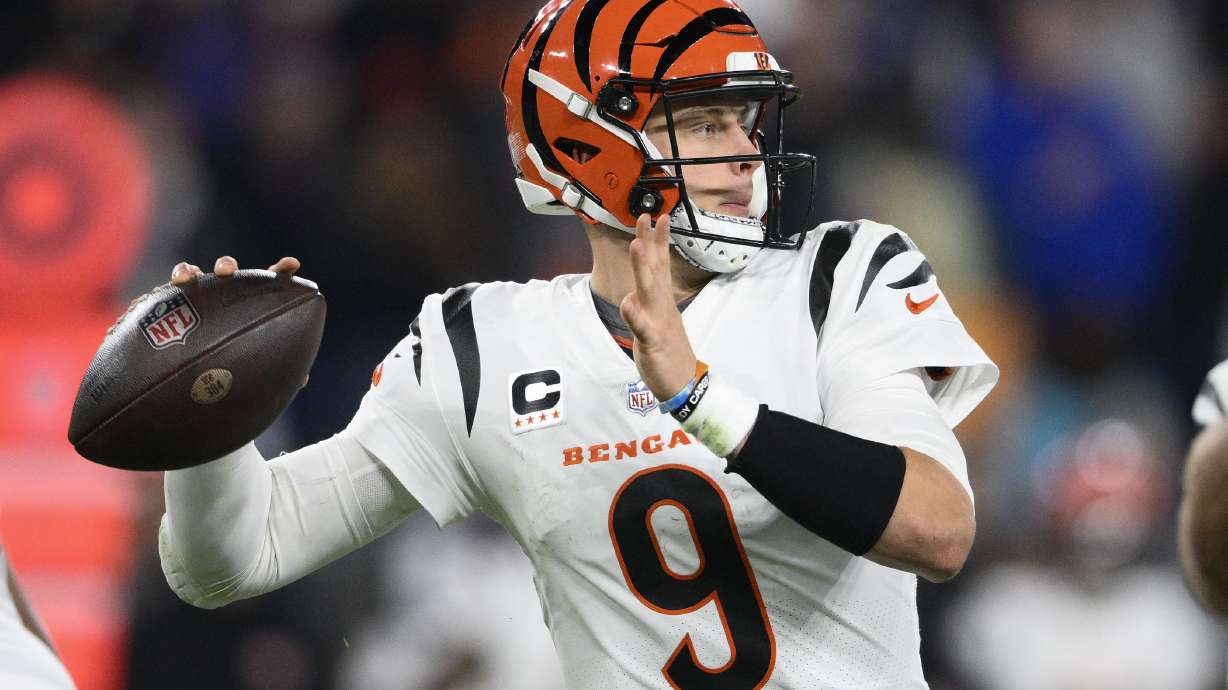 Cincinnati Bengals quarterback Joe Burrow (9) looks to pass in the first half of an NFL football game against the Baltimore Ravens in Baltimore, Thursday, Nov. 16, 2023.
