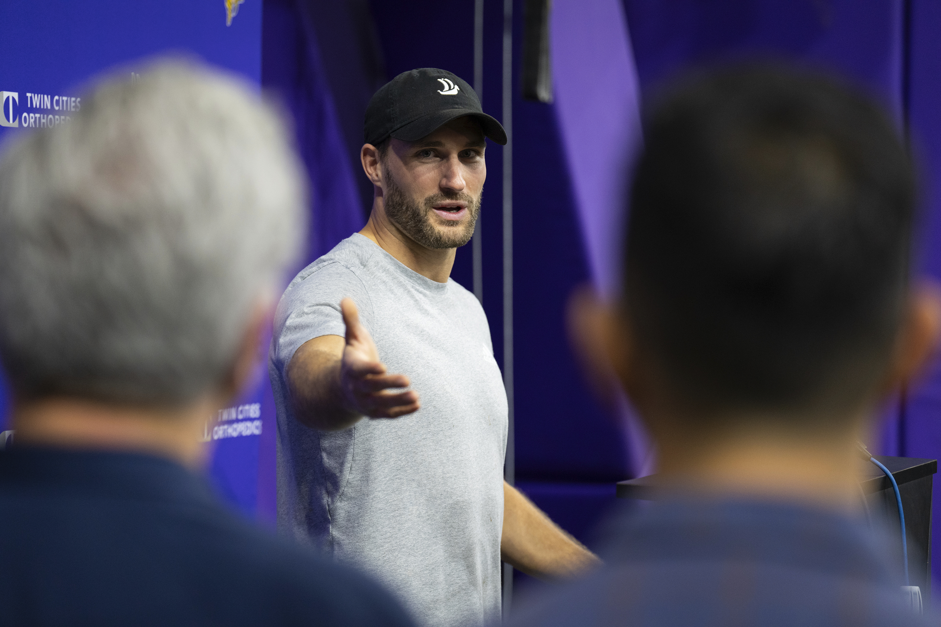 For the first time since tearing his achilles tendon, Minnesota Vikings quarterback Kirk Cousins speaks at an NFL football news conference in Eagan, Minn., Friday, Nov. 17, 2023. 