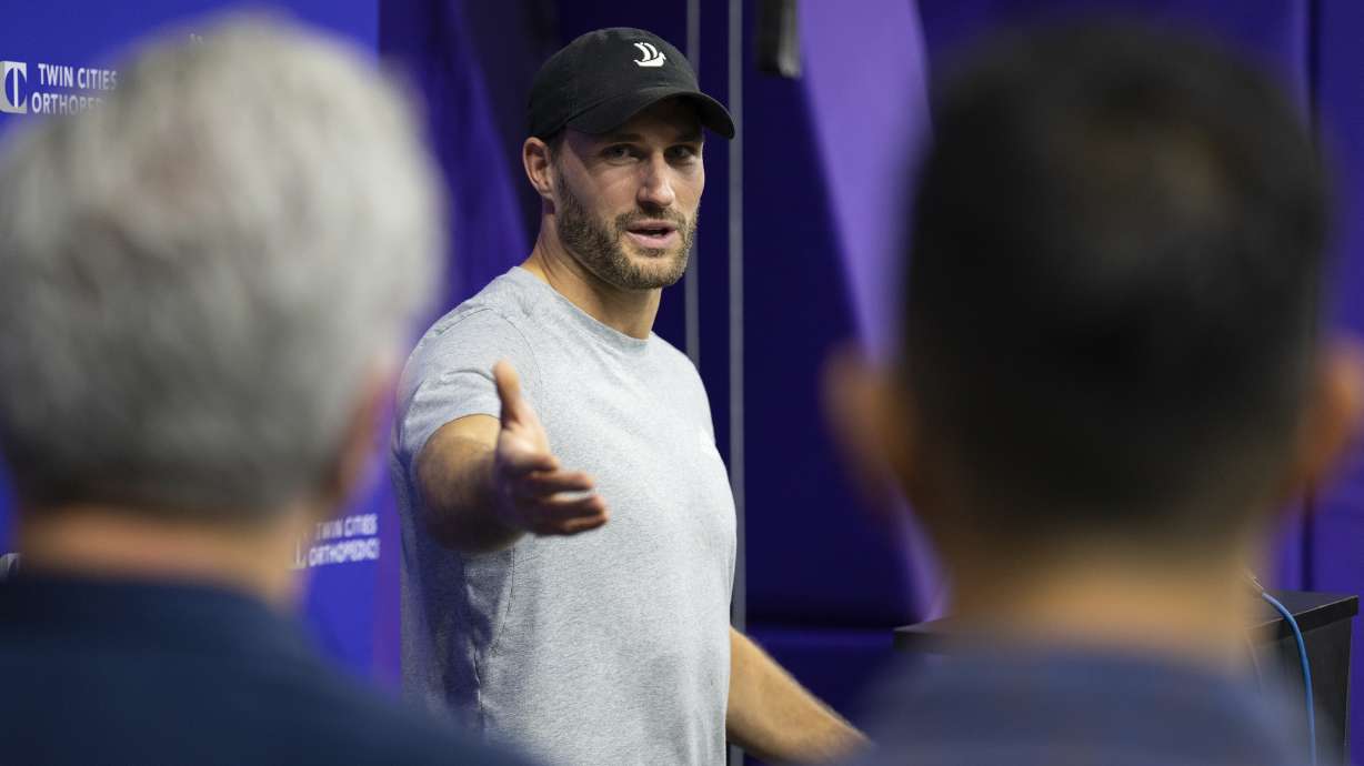 For the first time since tearing his achilles tendon, Minnesota Vikings quarterback Kirk Cousins speaks at an NFL football news conference in Eagan, Minn., Friday, Nov. 17, 2023.