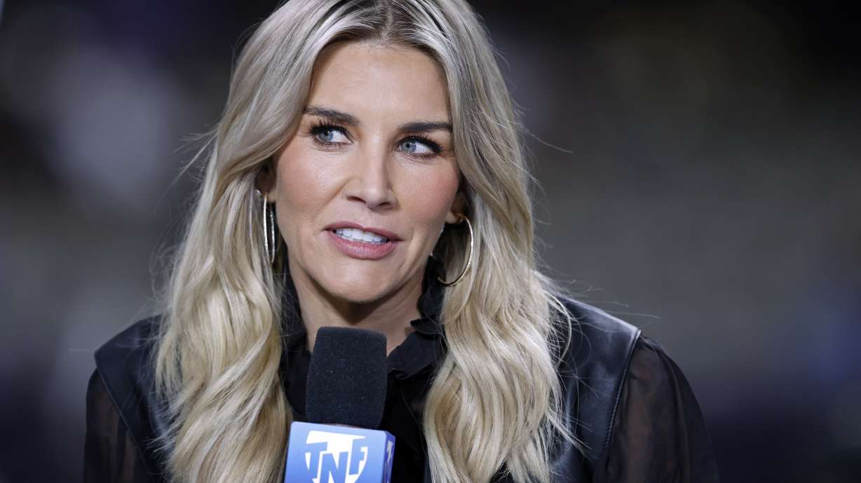 FILE - Amazon Prime Thursday Night Football commentator Charissa Thompson speaks before an NFL football game between the New Orleans Saints and the Jacksonville Jaguars, Oct. 19, 2023, in New Orleans. Fox Sports and Amazon host Thompson took to social media on Friday, Nov. 17, to clarify remarks she had made on a podcast earlier this week when she said “she made up” sideline reports on NFL games. Thompson, who hosts Fox's NFL Kickoff Sunday show and Amazon Prime Video's “Thursday Night Football” coverage, said in a post Friday that she did not make up quotes from players or coaches, and that what she would report were her observations on the sidelines.