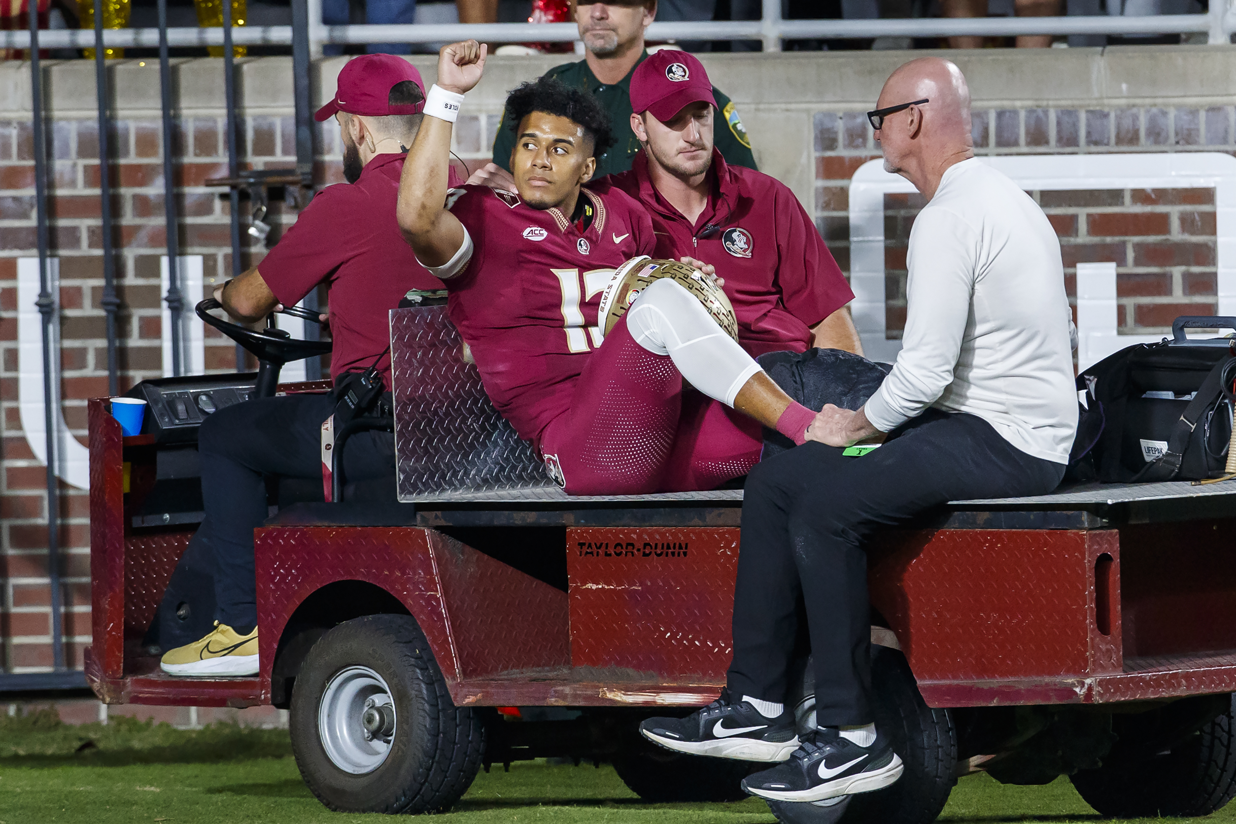 Florida State quarterback Jordan Travis is taken off the field after being injured during the first half of the team's NCAA college football game against North Alabama, Saturday, Nov. 18, 2023, in Tallahassee, Fla. 