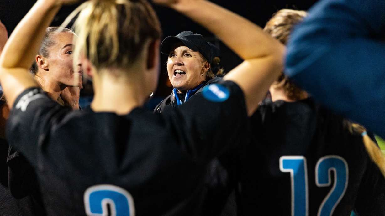 Brigham Young head coach Jennifer Rockwood talks to her team after their win during the Sweet 16 round of the NCAA College Women’s Soccer Tournament against Michigan State at South Field in Provo on Saturday, Nov. 18, 2023.